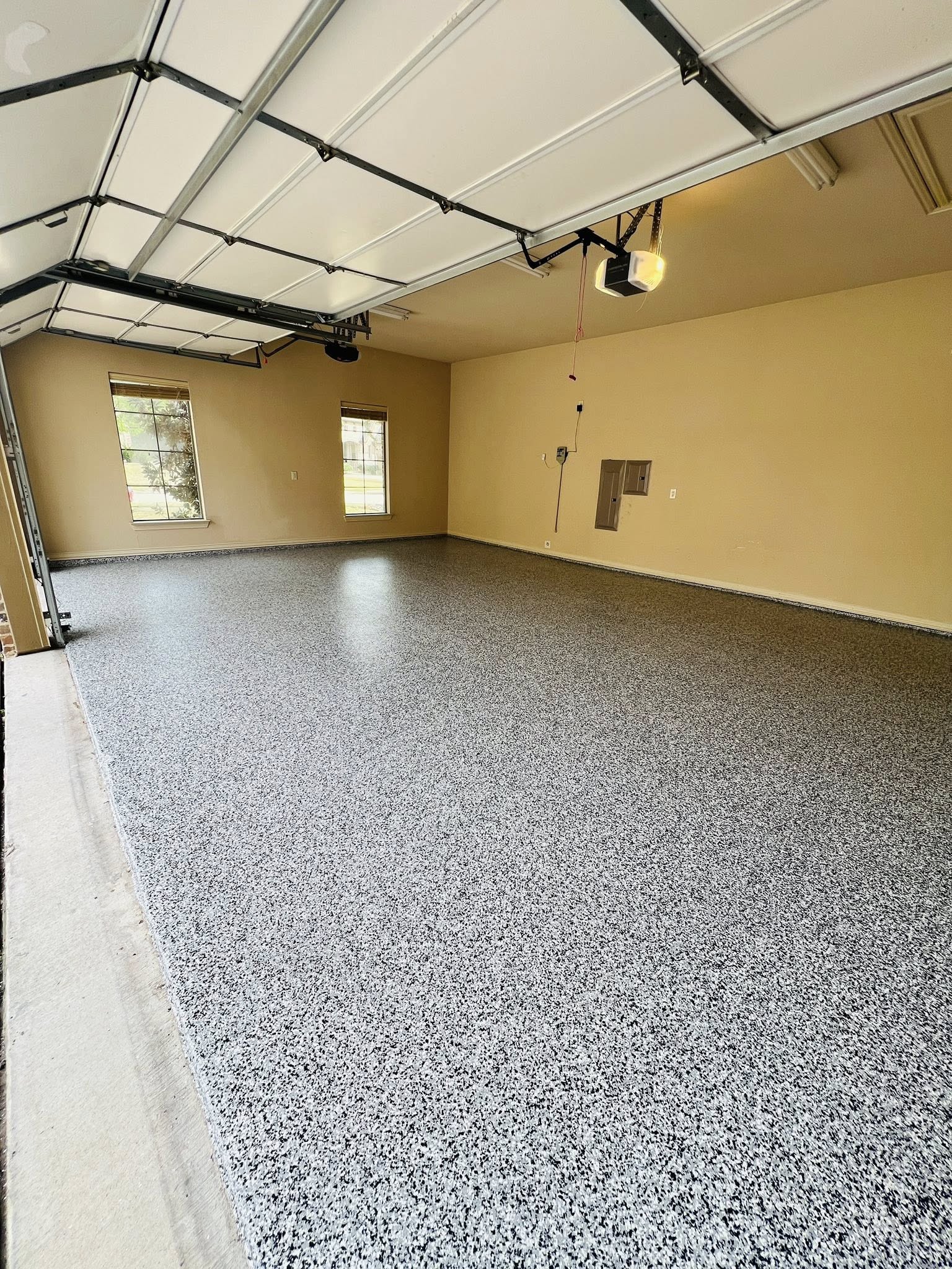 Finished flake epoxy floor coating installed by EPOXY Flooring by NovaRiver LLC in DFW