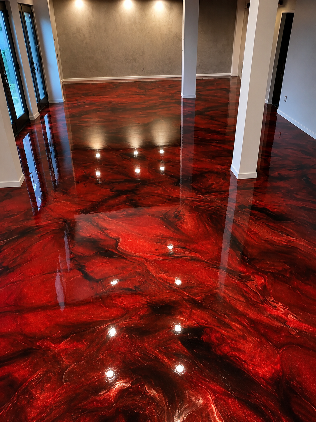 Colored metallic epoxy floor coating with high gloss marbled finish in DFW